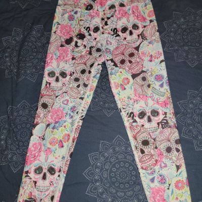 EVCR leggings, skull design, size medium, multicolored