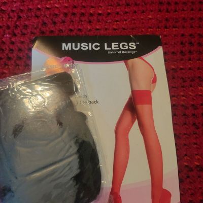 Music Legs Hosiery: Black sheer thigh-hi stockings w/ rhinestones down the back