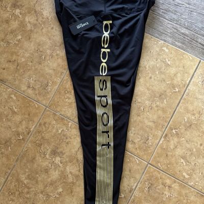 Bebe Sport Leggings Size: Color: 1X Black with Gold MSRP: $84