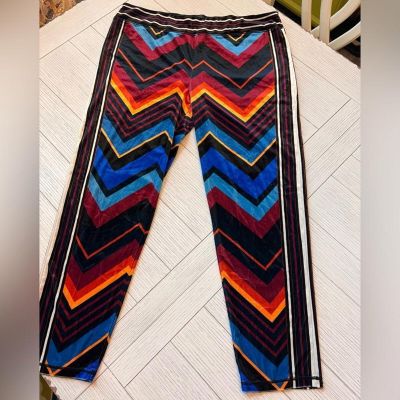 Velour track pant leggings w/ vibrant chevron print. Poly, spandex. Size 3X