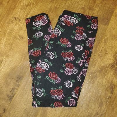 LulaRoe black with floral rose design leggings. Tall and curvy