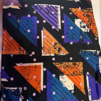 TC LuLaRoe Tall & Curvy Leggings. Black Background