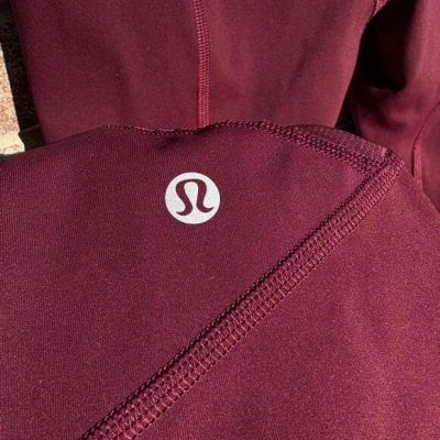 Burgundy Lululemon high-waisted leggings Size 4 women's. Good used condition.