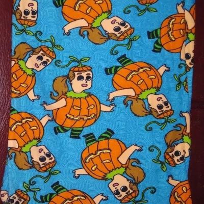 NWT LuLaRoe OS Halloween Girl Dressed up in pumpkin costume on bright blue