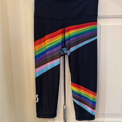 PELOTON women's WITH leggings. Black & rainbow colors. Reversible Size Large